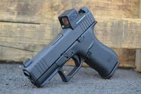 Glock 43X MOS 9mm pistol featuring a slim profile, optics-ready slide with front serrations, and 10-round magazine – ideal for discreet everyday carry